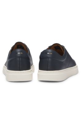 Low-top trainers in leather with embossed logo, Dark Blue