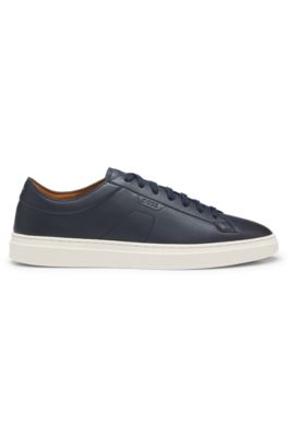 Low-top trainers in leather with embossed logo, Dark Blue