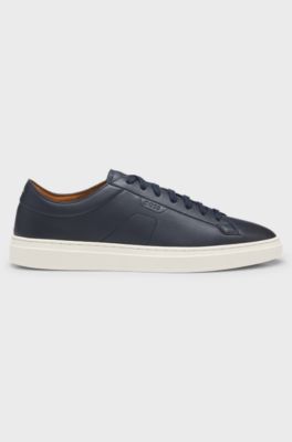 Low-top trainers in leather with embossed logo, Dark Blue