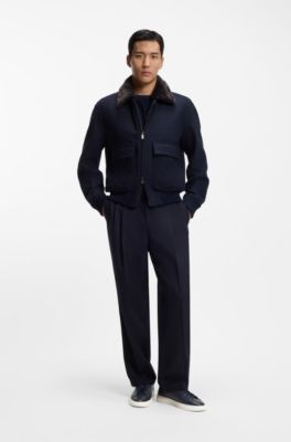 Low-top trainers in leather with embossed logo, Dark Blue