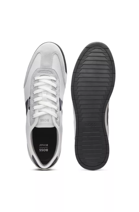 Low-top trainers with structured trims
