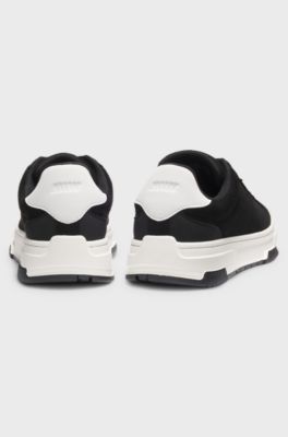 Low-top trainers in faux suede, Black