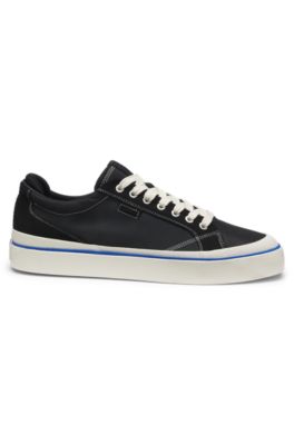 Low-top trainers with blue-line outsole, Black