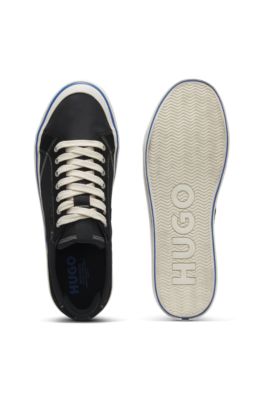 Low-top trainers with blue-line outsole, Black