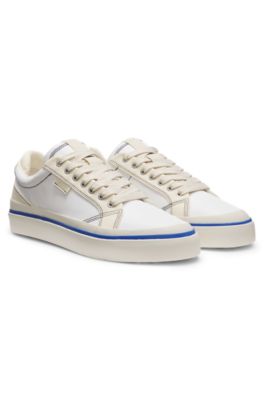 Low-top trainers with blue-line outsole, White