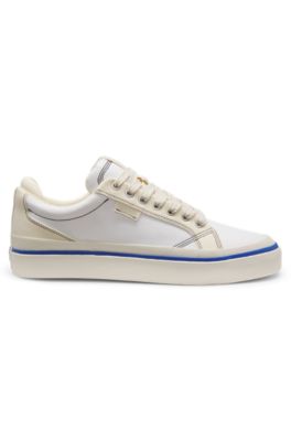 Low-top trainers with blue-line outsole, White