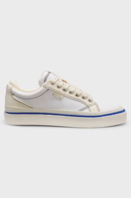 Low-top trainers with blue-line outsole, White