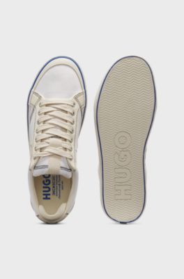 Low-top trainers with blue-line outsole, Natural