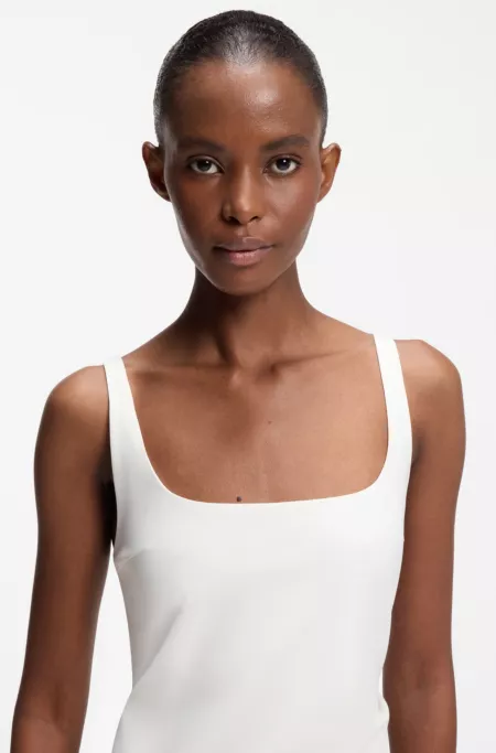 Square-neck dress with golden chain belt