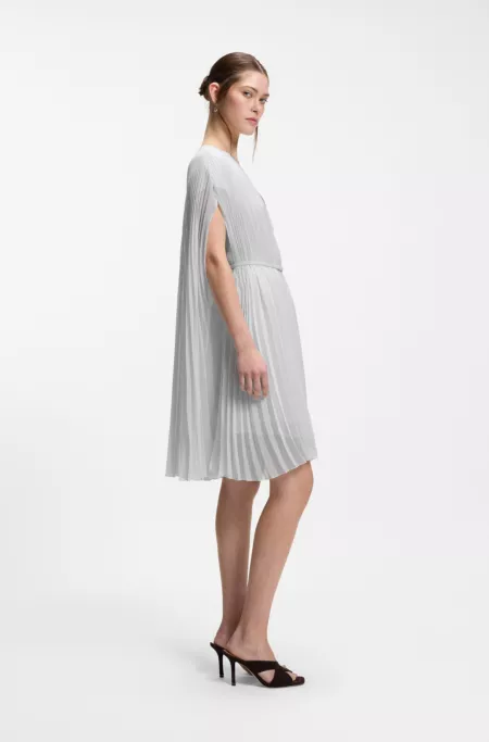 Layered plissé dress with cape