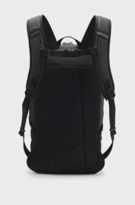 Rucksack aus Kunstleder mit reflektierenden Details, Schwarz