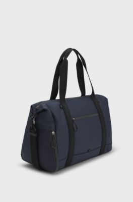 Sac de voyage en similicuir avec d&eacute;tails r&eacute;fl&eacute;chissants, Bleu fonc&eacute;