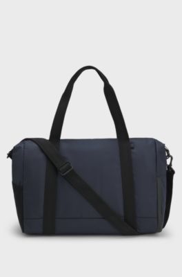 Sac de voyage en similicuir avec d&eacute;tails r&eacute;fl&eacute;chissants, Bleu fonc&eacute;