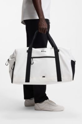 Faux-leather holdall with reflective zips, White