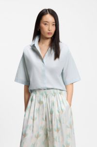 Blusa relaxed fit en popel&iacute;n de algod&oacute;n con cuello en pico, Celeste