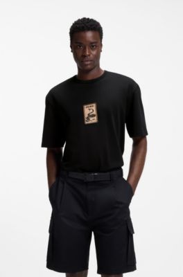 T-shirt in jersey di cotone con targhetta ricamata, Nero