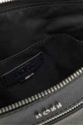 BOSS - Zipped envelope bag with polished logo lettering - Black