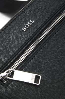 BOSS - Zipped envelope bag with polished logo lettering - Black