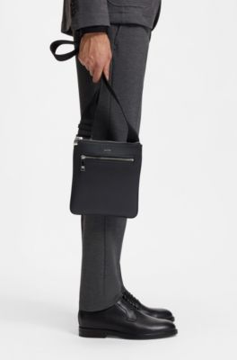 BOSS - Zipped envelope bag with polished logo lettering - Black