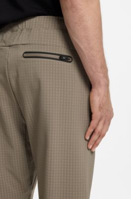 Drawstring trousers in stretch waffle fabric with framed zip, Light Green