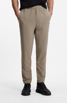 Drawstring trousers in stretch waffle fabric with framed zip, Light Green