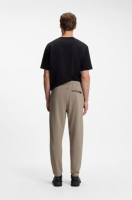 Drawstring trousers in stretch waffle fabric with framed zip, Light Green