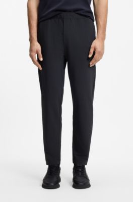 Drawstring trousers in stretch waffle fabric with framed zip, Dark Blue