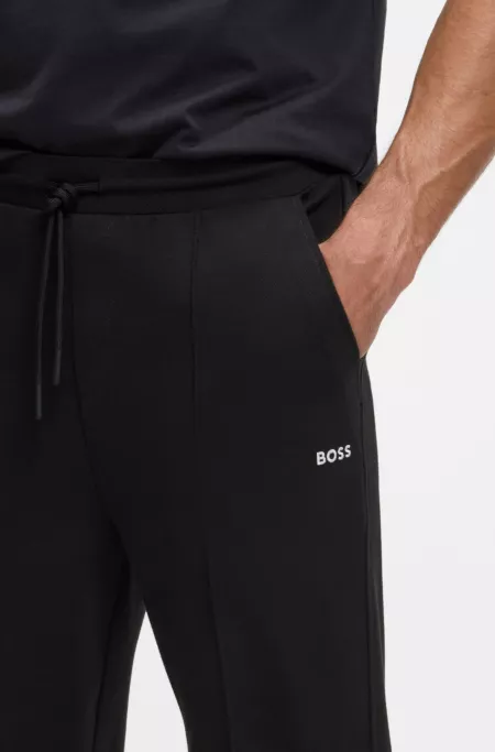 Cotton-blend tracksuit bottoms with pintuck pleats