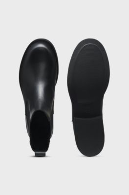 Bottines en cuir avec tirette logot&eacute;e, Noir