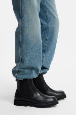 Bottines en cuir avec tirette logot&eacute;e, Noir