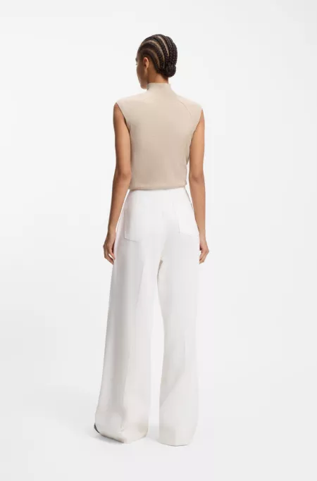 Wide-leg jeans in cream denim with front pleats