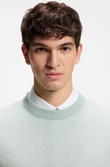 Cotton-blend sweater with two-tone knitted structure