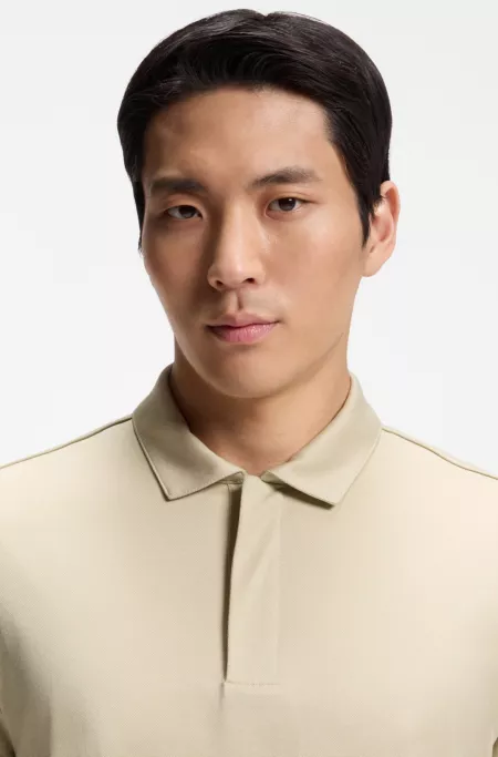 Cotton-blend polo shirt with covered zip