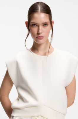 Sleeveless loose-fit sweatshirt with V-cut hemline, Natural