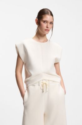 Sleeveless loose-fit sweatshirt with V-cut hemline, Natural