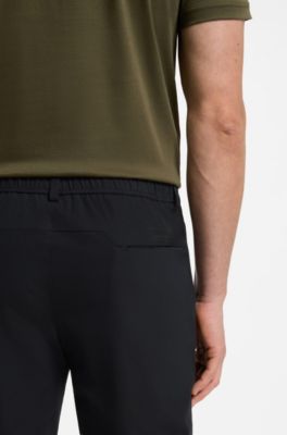 Porsche x BOSS tapered-fit trousers in water-repellent twill, Black