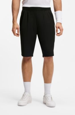 Shorts in tessuto facile da stirare con pieghe sulla parte anteriore, Nero