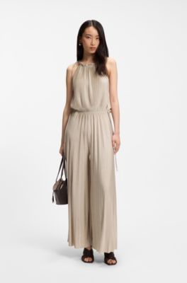 Halterneck jumpsuit in lustrous jersey with pliss&eacute; pleats, Beige