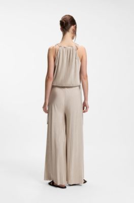 Halterneck jumpsuit in lustrous jersey with pliss&eacute; pleats, Light Beige