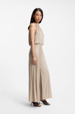 Halterneck jumpsuit in lustrous jersey with pliss&eacute; pleats, Beige