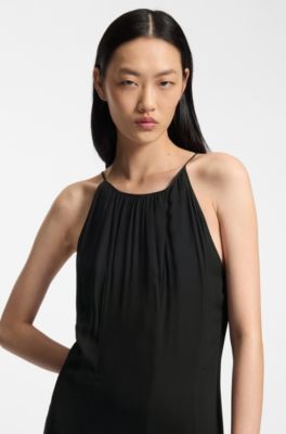 Sleeveless dress with pliss&eacute; skirt inserts, Black