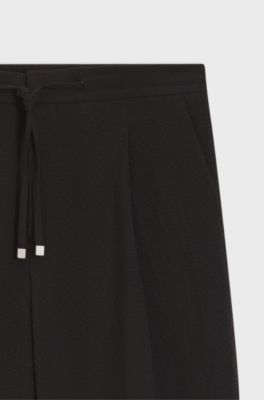 Modern-fit trousers in stretch-cotton seersucker, Black
