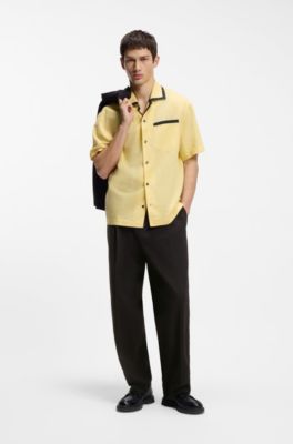 Pantaloni con fit moderno in seersucker di cotone elasticizzato, Nero