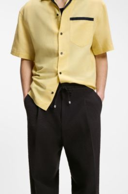Modern-fit trousers in stretch-cotton seersucker, Black