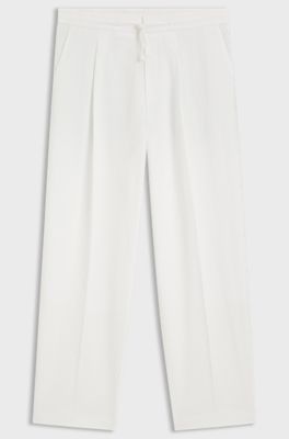 Pantaloni con fit moderno in seersucker di cotone elasticizzato, Colore neutro