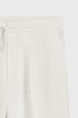 Modern-fit trousers in stretch-cotton seersucker, Natural