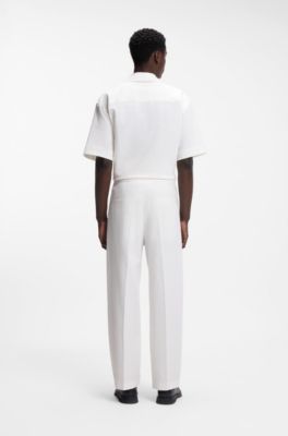 Pantaloni con fit moderno in seersucker di cotone elasticizzato, Colore neutro