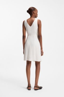 Wrap dress in crepe fabric with D-ring detail, Natural