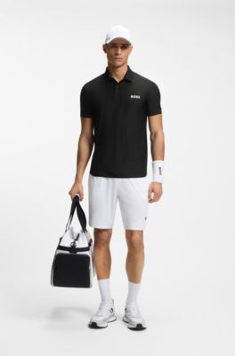 Polo slim fit in jersey a righe elasticizzato in quattro direzioni, Nero