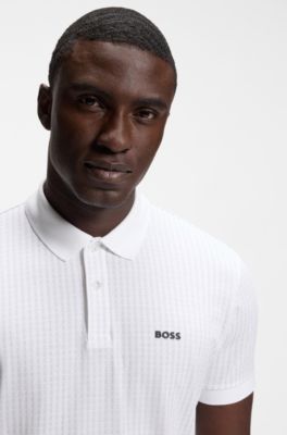Polo in piqu&eacute; di cotone con stampa all-over, Bianco